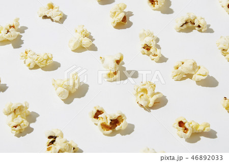 Full of popcorn in classic striped box on color ba 46892033