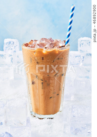 Summer drink ice coffee with cream in a tall glass 46892900