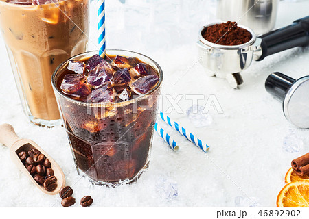 Summer drink iced coffee or soda in a glass 46892902