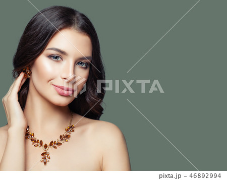 Glamorous jewelry model. Perfect brunette woman Glamorous jewelry model. Perfect brunette woman 46892994