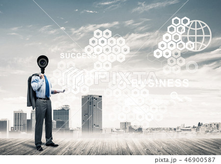 Camera headed man standing on wooden floor against modern citysc Camera headed man standing on wooden floor against modern citysc 46900587