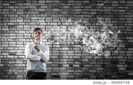 Conceptual image of young businessman. Conceptual image of young businessman. 46900749