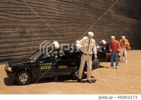 a small figure with the japan taxi 46903373