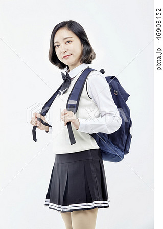 女子学生 韓国人 ユニフォームの写真素材