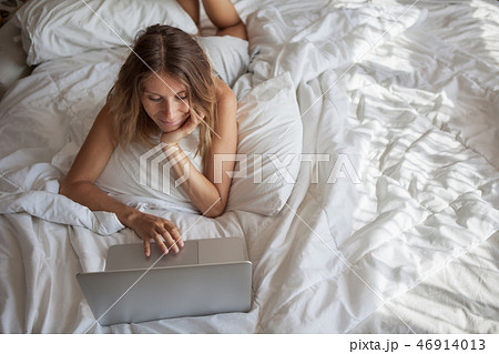 Woman Enjoying Morning And Using Laptop Woman Enjoying Morning And Using Laptop 46914013