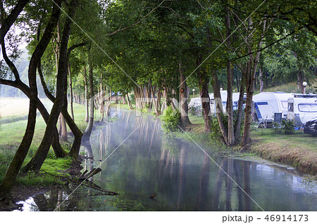 Camping site near water in France Camping site near water in France 46914173