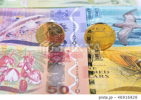 Fijian Dollar coins on the background of banknotes 46916826