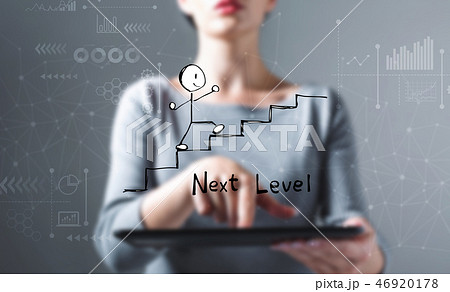 Next level concept with woman using a tablet 46920178