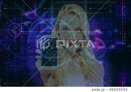 Young woman holding out a cellphone Young woman holding out a cellphone 46920205