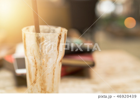empty cup of iced mocha coffee on wooden table 46920439