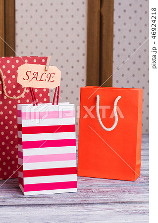 Set of colored paper shopping bags. Set of colored paper shopping bags. 46924218