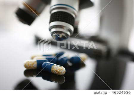 Tablets scattered on the table of the 46924650