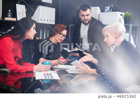 Office workers discuss their project over Cup of tea Office workers discuss their project over Cup of tea 46925362