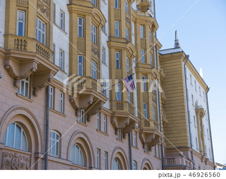 Wrapped around flagpole flag of the USA  46926560