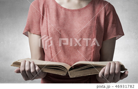 Girl with opened red book Girl with opened red book 46931782