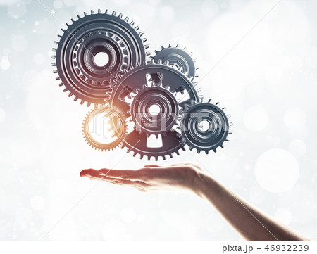Concept of teamwork and cooperation presented with working gear 46932239