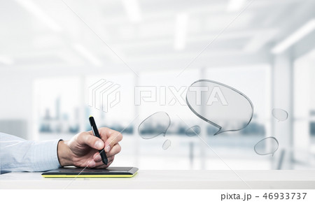 Male hands using graphics tablet and glass icons fly in air. Mix Male hands using graphics tablet and glass icons fly in air. Mix 46933737