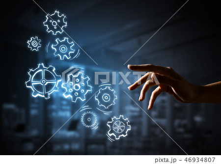 Sketched cogwheel mechanism as teamwork concept on dark background. Mixed media Sketched cogwheel mechanism as teamwork concept on dark background. Mixed media 46934807