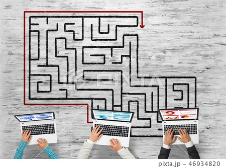 Top view of businesspeople sitting at table and using gadgets 46934820