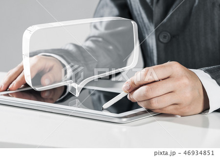 Female hands using graphics tablet and glass icons fly in air. M Female hands using graphics tablet and glass icons fly in air. M 46934851
