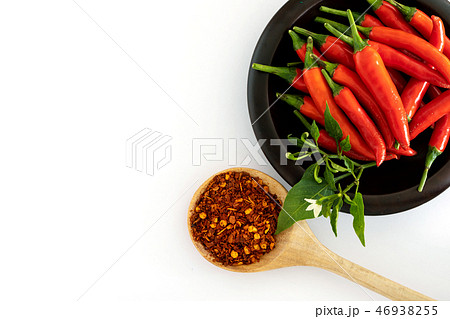 fresh red chilli pepper and crushed dried red  46938255