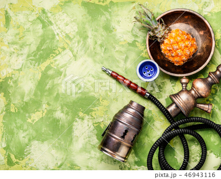Oriental shisha with pineapple Oriental shisha with pineapple 46943116