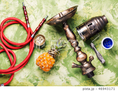 Oriental shisha with pineapple Oriental shisha with pineapple 46943171