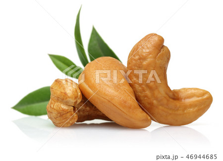 Roasted cashew nuts with green leaves 46944685