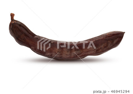 Ripe carob pod on white background 46945294