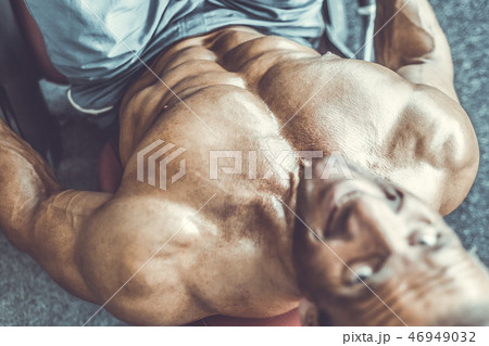 Brutal aged strong bodybuilder athletic men pumping up muscles w Brutal aged strong bodybuilder athletic men pumping up muscles w 46949032