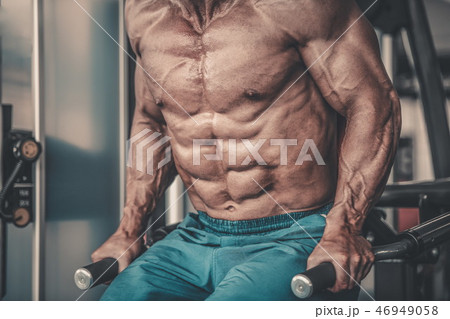 Brutal aged strong bodybuilder athletic men pumping up muscles w Brutal aged strong bodybuilder athletic men pumping up muscles w 46949058
