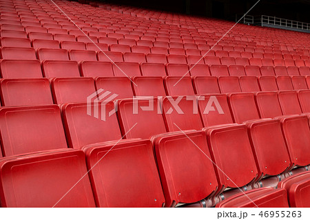 Red seat row in stadium 46955263