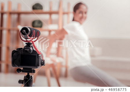 Sporty woman doing exercises at home 46958775