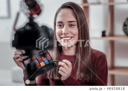 Popular video blogger advertising new cosmetics brand Popular video blogger advertising new cosmetics brand 46958818