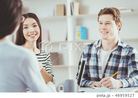 Pleasant cheerful man smiling 46959527