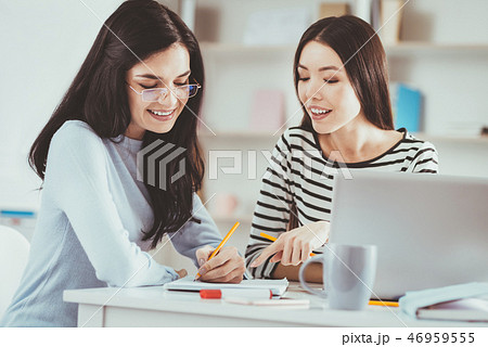 Delighted nice students taking notes Delighted nice students taking notes 46959555