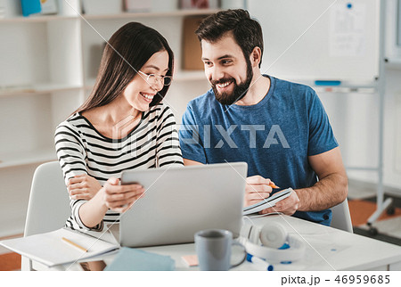 Young cute couple thinking about starting family business 46959685