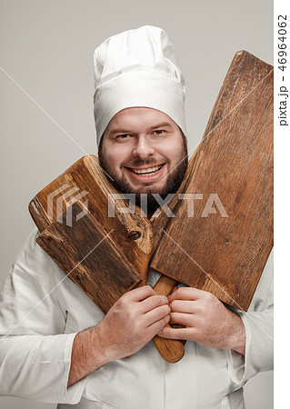 Cheerful chef with wooden box Cheerful chef with wooden box 46964062