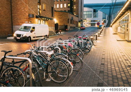 Helsinki, Finland. Bicycles Parked Near Storefronts In Postgrand Helsinki, Finland. Bicycles Parked Near Storefronts In Postgrand 46969145