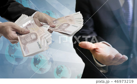 Businessman hand pay money, Payment technology  46973219