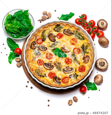 Baked homemade quiche pie in ceramic baking form Baked homemade quiche pie in ceramic baking form 46974207