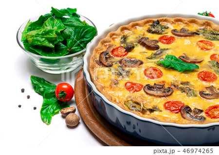 Baked homemade quiche pie in ceramic baking form 46974265