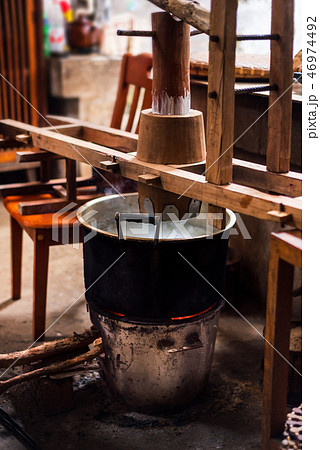 Traditional noodles in making on a vintage machine 46974492