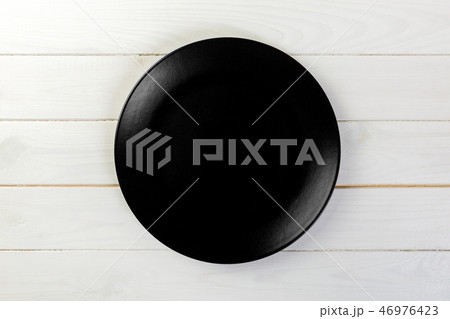 Directy above Empty black matte dish for dinner の写真素材 [46976423] - PIXTA