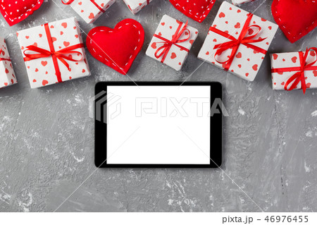 tablet blank screen with gift box and heart tablet blank screen with gift box and heart 46976455