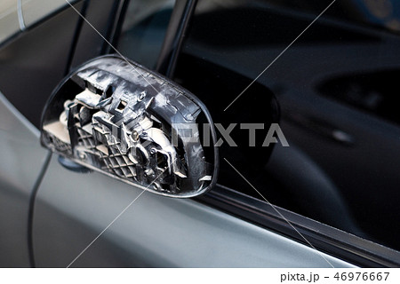 Car with broken rear mirror closeup 46976667