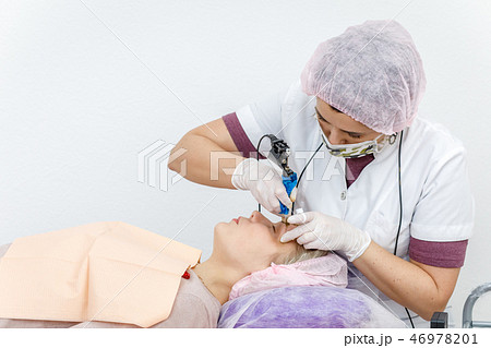 Permanent makeup, tattooing of eyebrows Permanent makeup, tattooing of eyebrows 46978201