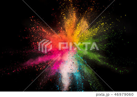 Colored powder explosion on black background. Colored powder explosion on black background. 46979060