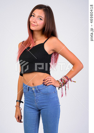 Portrait of young beautiful woman against white background 46980418