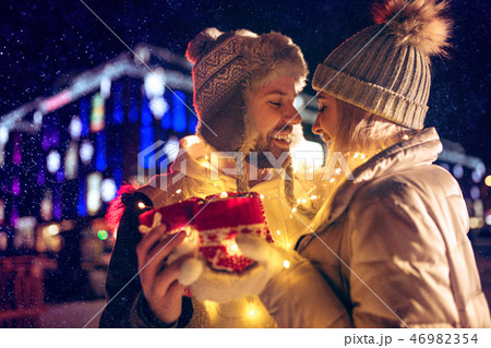 Adult couple hanging out in the city during Christmas time 46982354